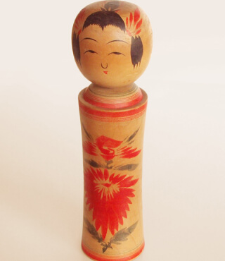 Búp bê Kokeshi không tay, không chân.